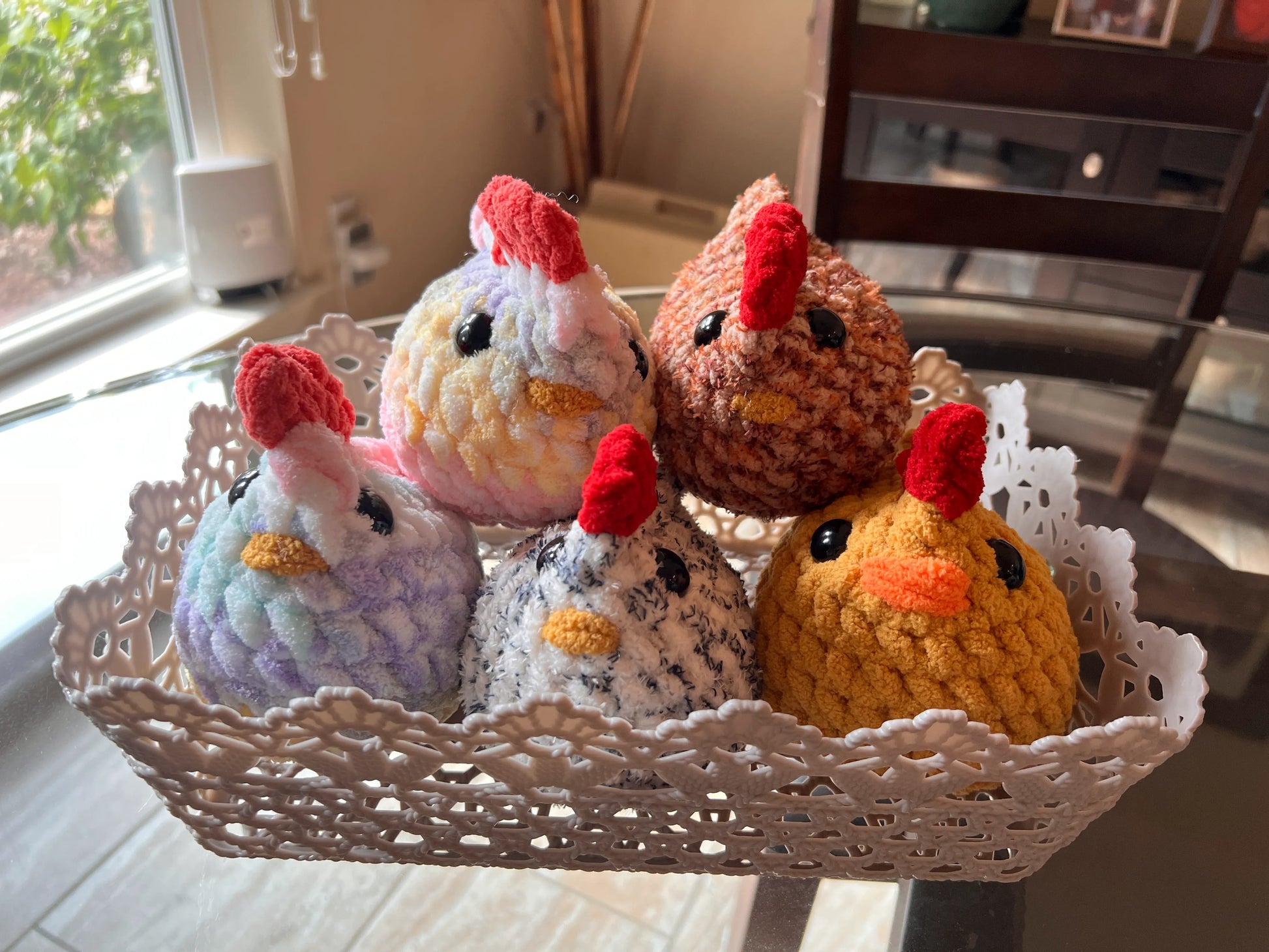 Front view of the chicken plushies together