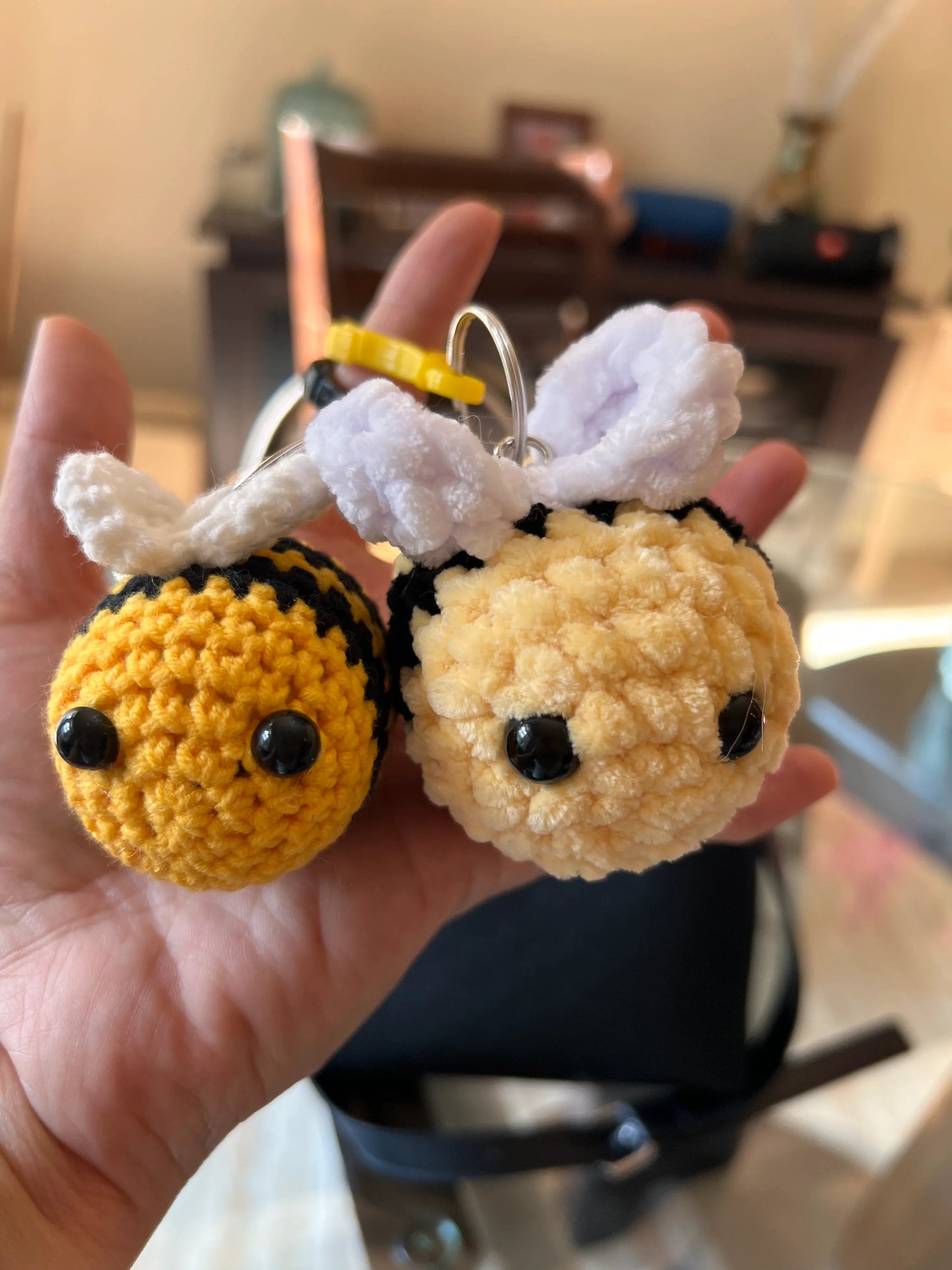 Front view of keychain bee plushies