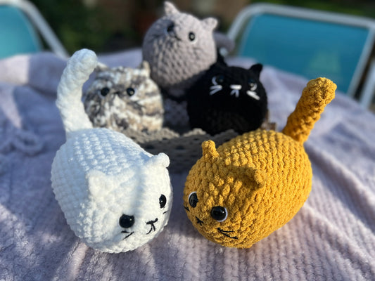 Front view of the various loaf cat plushies