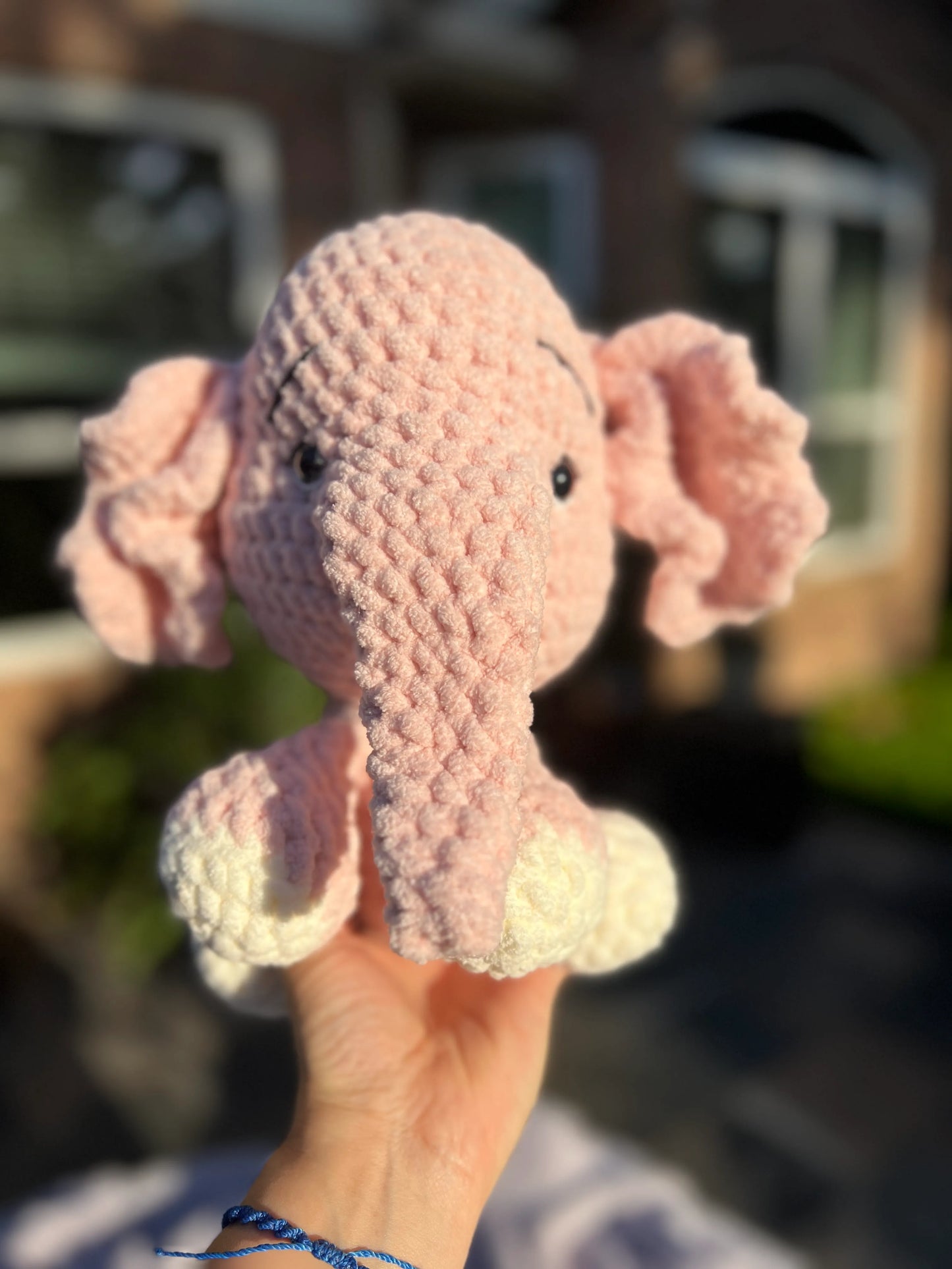 Front view of the pink elephant plushie