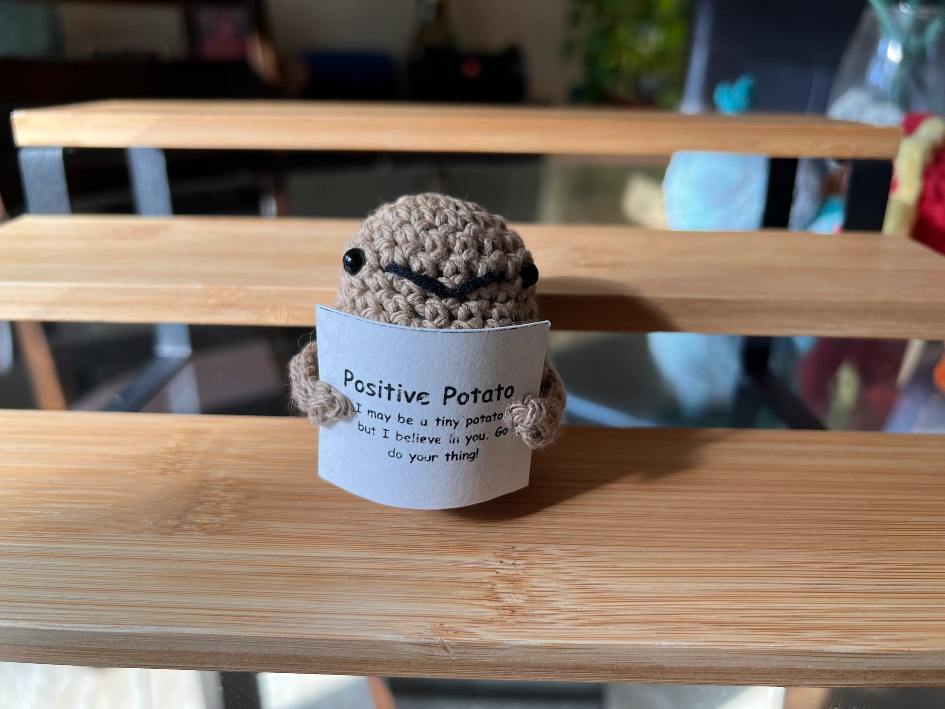 Front view of the positive potato plushie