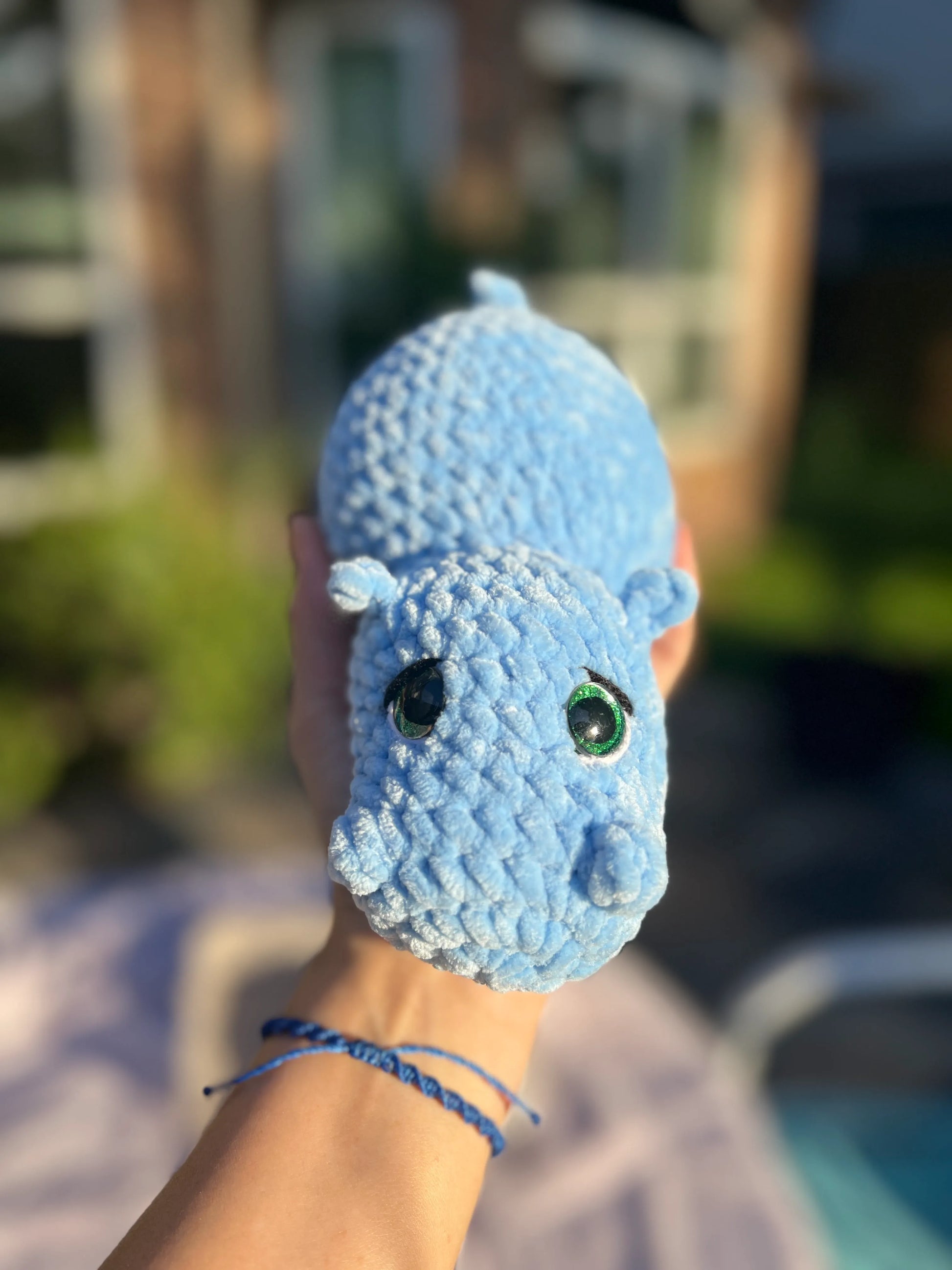 Front view of the sky-blue hippo plushie