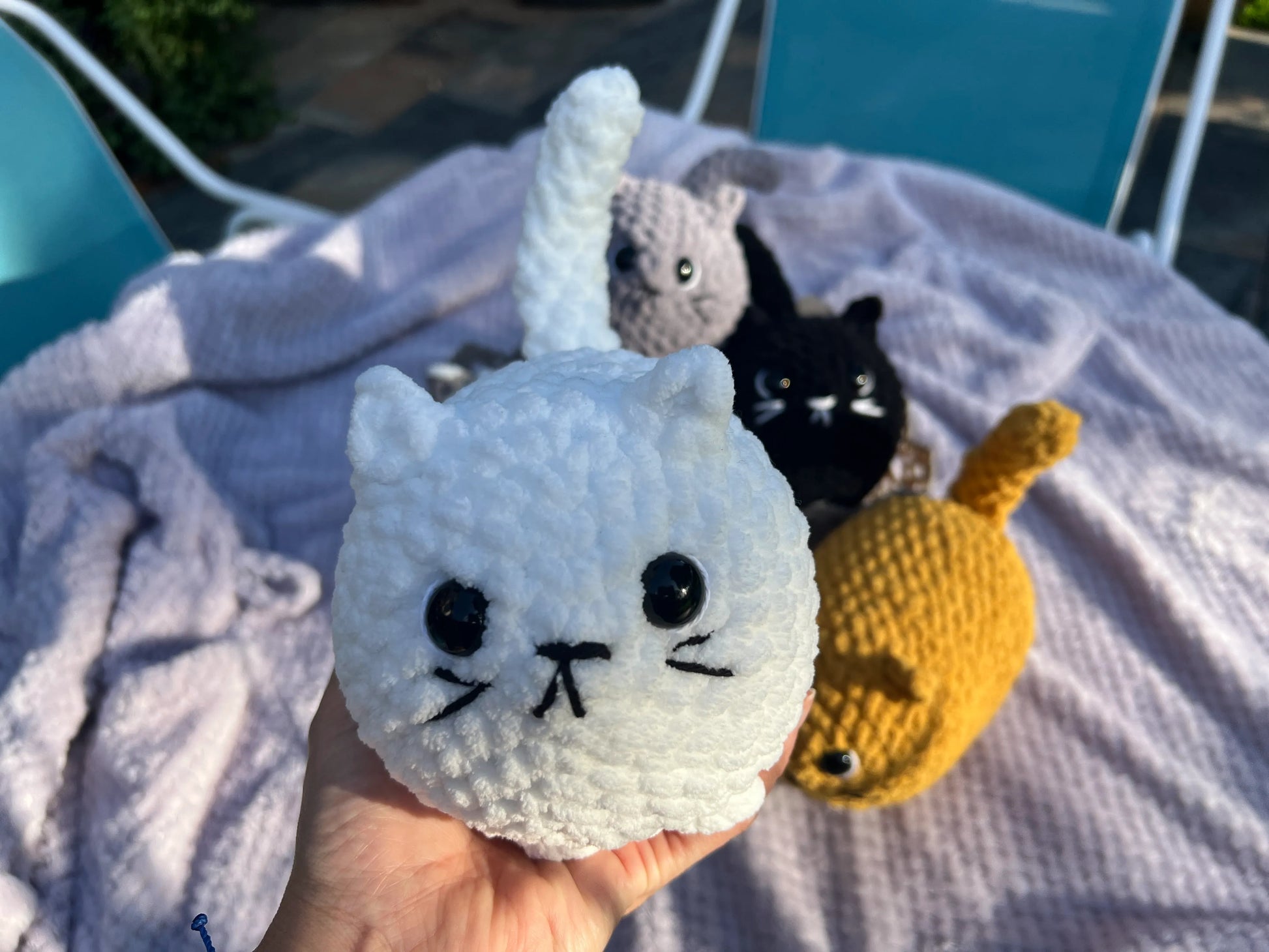 Front view of the sky-blue loaf cat plushie